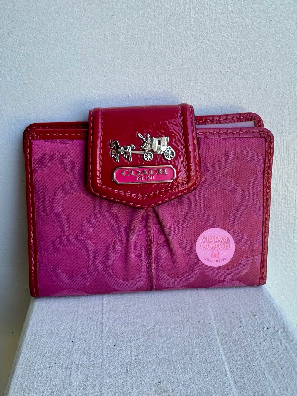 95$ Coach monogram, horse and carriage, pink, compact wallet ( I have two